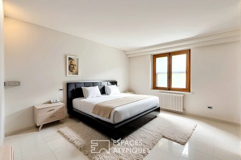 Maison familiale avec sous-sol exceptionnel et jardin arboré