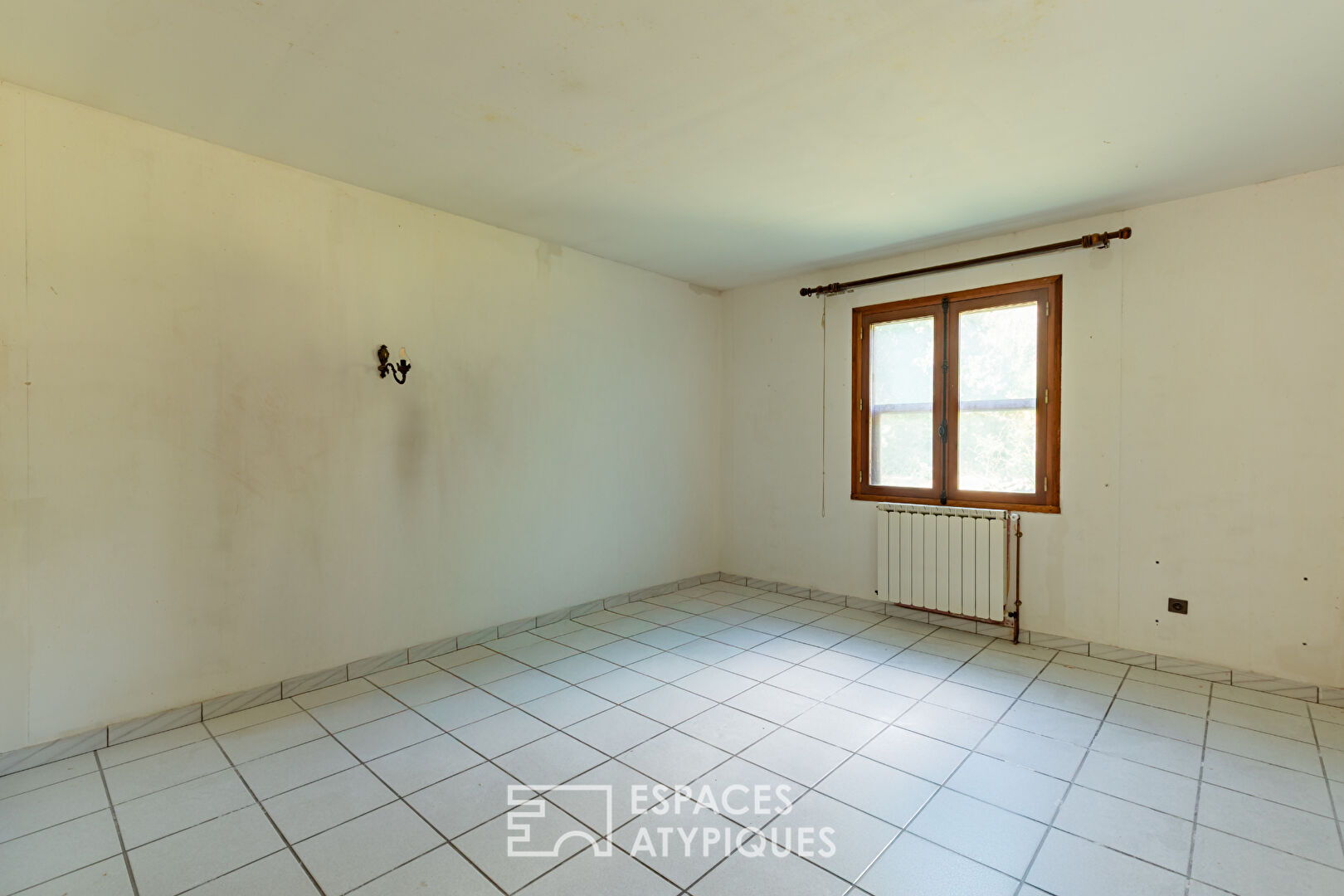 Maison familiale avec sous-sol exceptionnel et jardin arboré