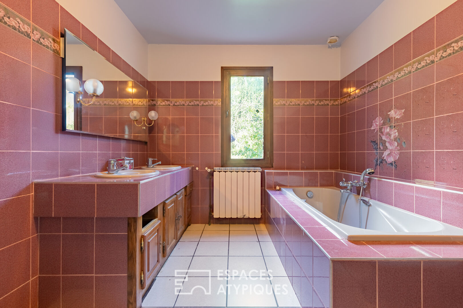 Maison familiale avec sous-sol exceptionnel et jardin arboré