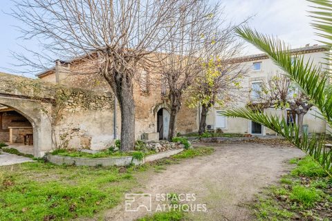 Village house with outbuildings – Project with potential for development