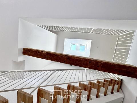 Réhabilitation d&rsquo;architecte : le cachet d&rsquo;une remise 1900 aux volumes épurés