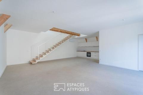 Réhabilitation d&rsquo;architecte : le cachet d&rsquo;une remise 1900 aux volumes épurés