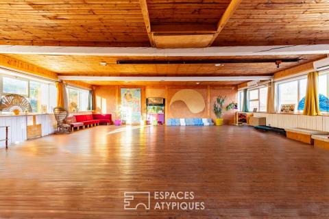 Bâtiment industriel rénové avec volumes exceptionnels et potentiel d’aménagement