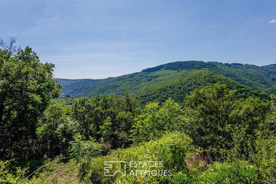 Ancienne ferme de caractère et 16 hectares au coeur de la Montagne Noire