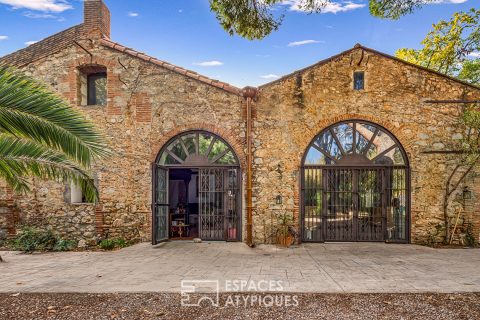 19th century estate with its outbuildings and swimming pool