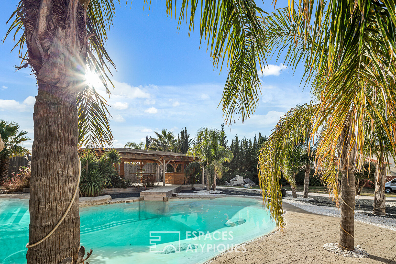 Contemporary house with beach and lagoon swimming pool