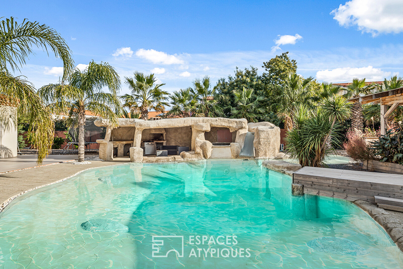 Contemporary house with beach and lagoon swimming pool