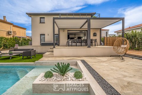 Superb contemporary villa with swimming pool and landscaped garden.