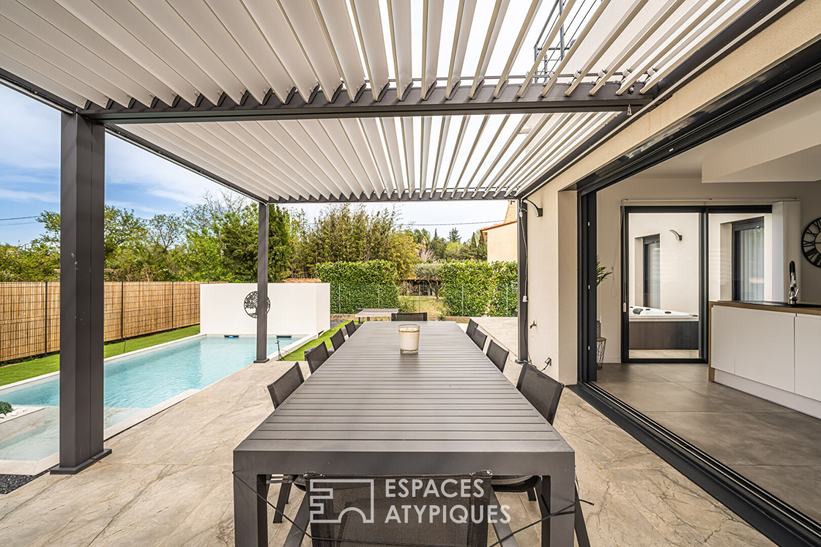 Superb contemporary villa with swimming pool and landscaped garden.