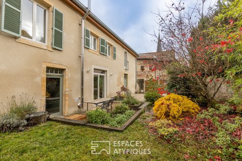 Revamped winegrower’s house and its green garden