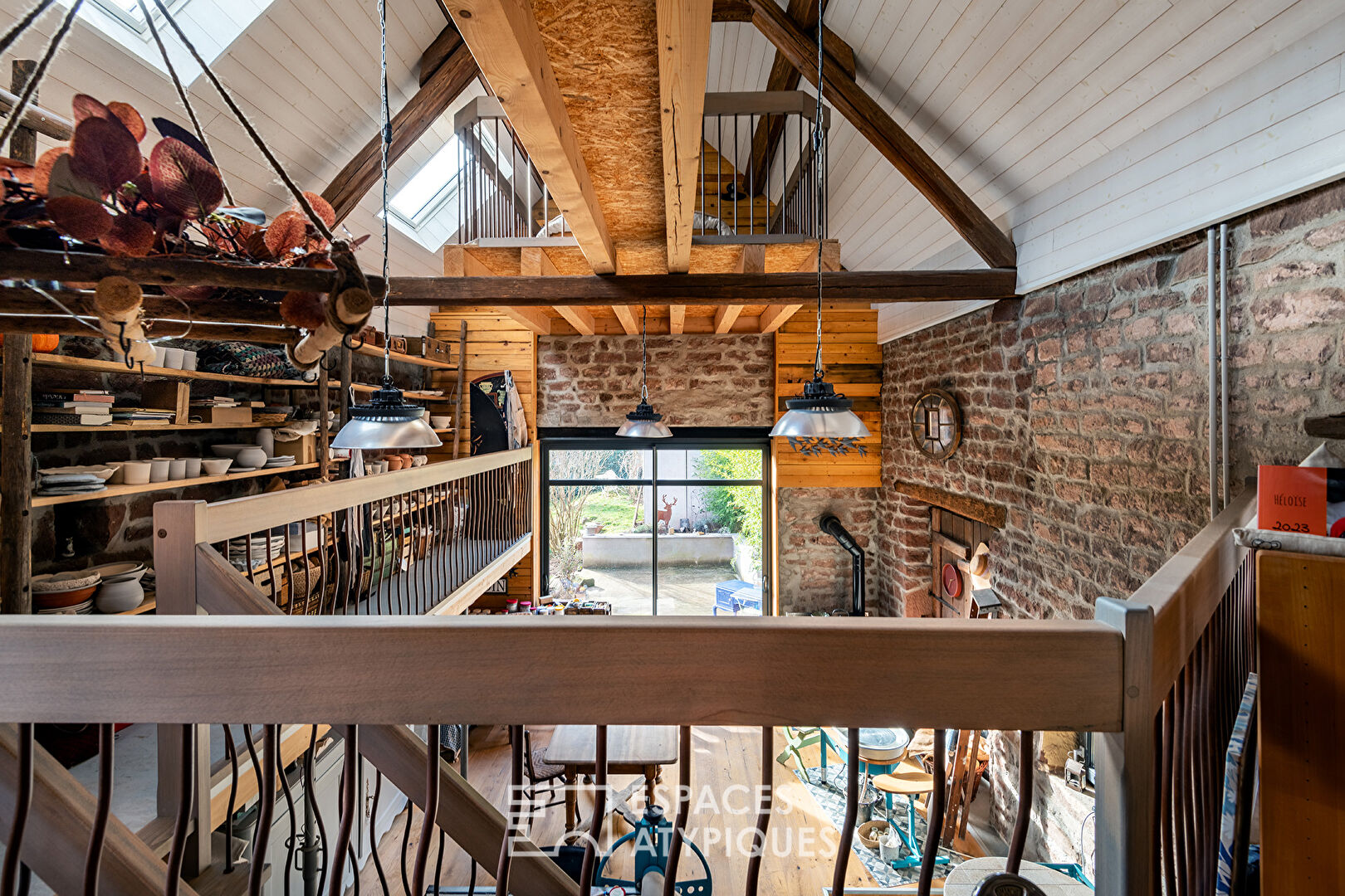 Loft in a former clog factory and its garden