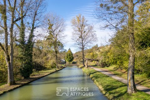 Charming mill and its verdant grounds