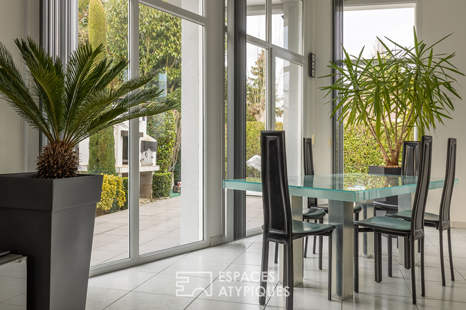 Contemporary house with swimming pool and garden