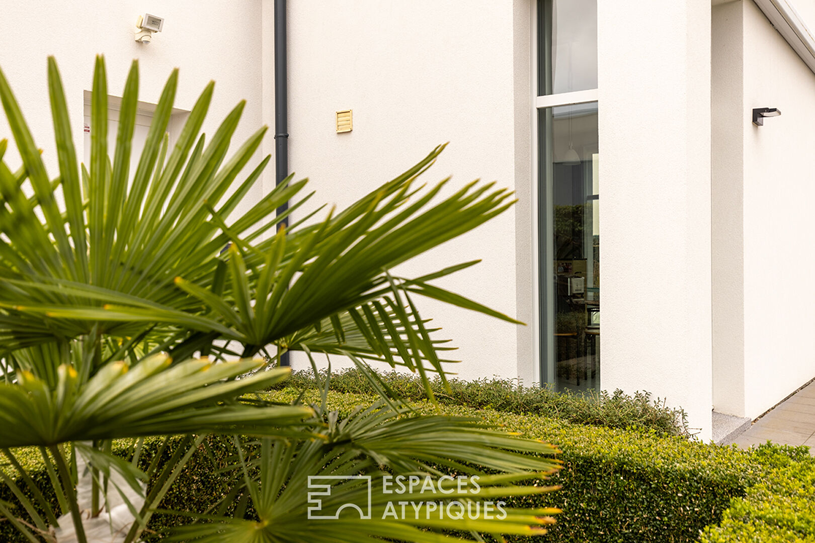 Contemporary house with swimming pool and garden