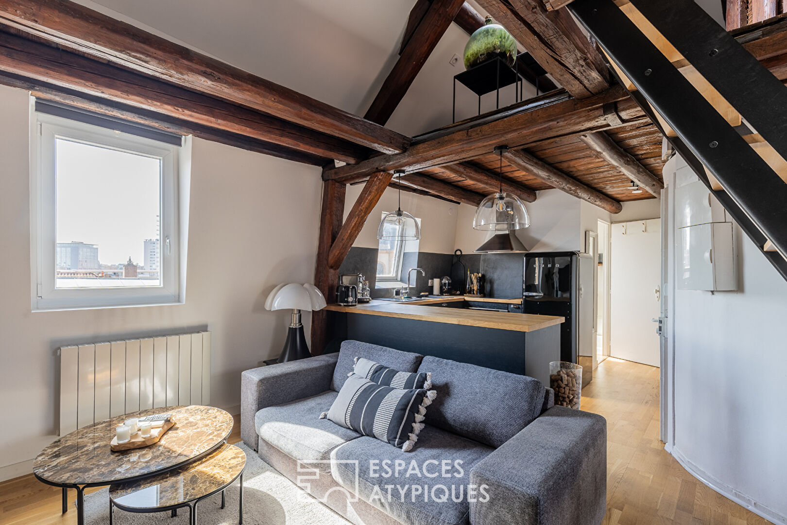 Duplex en dernier étage en coeur de ville