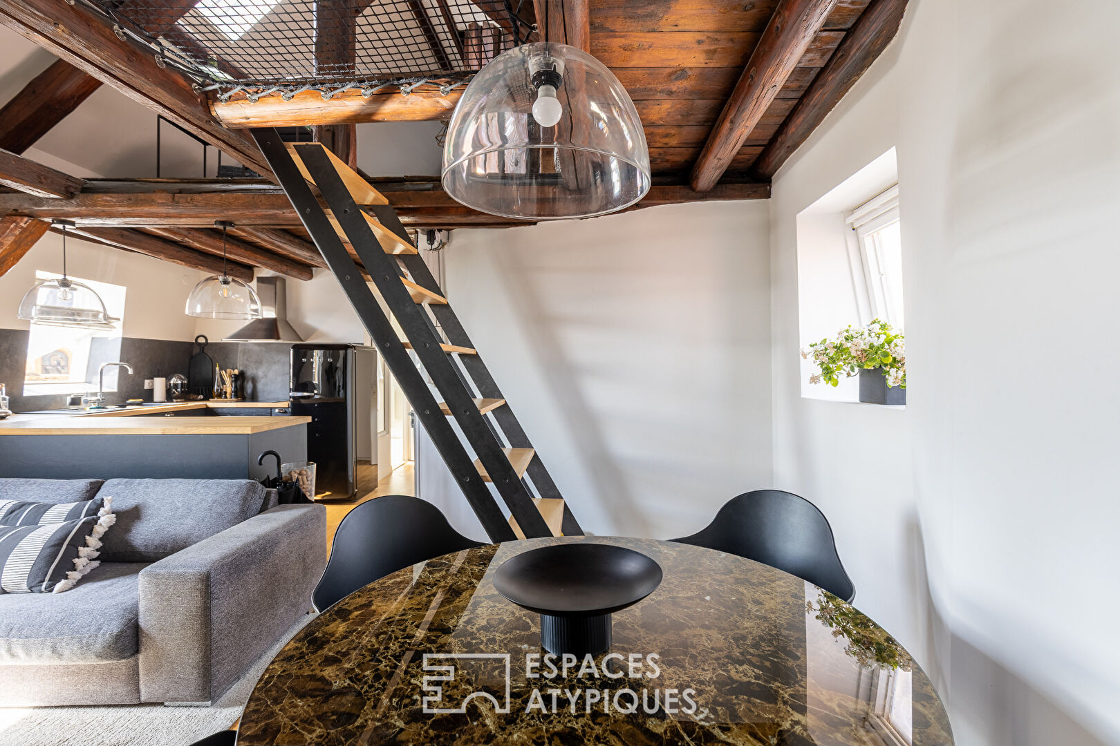 Duplex en dernier étage en coeur de ville