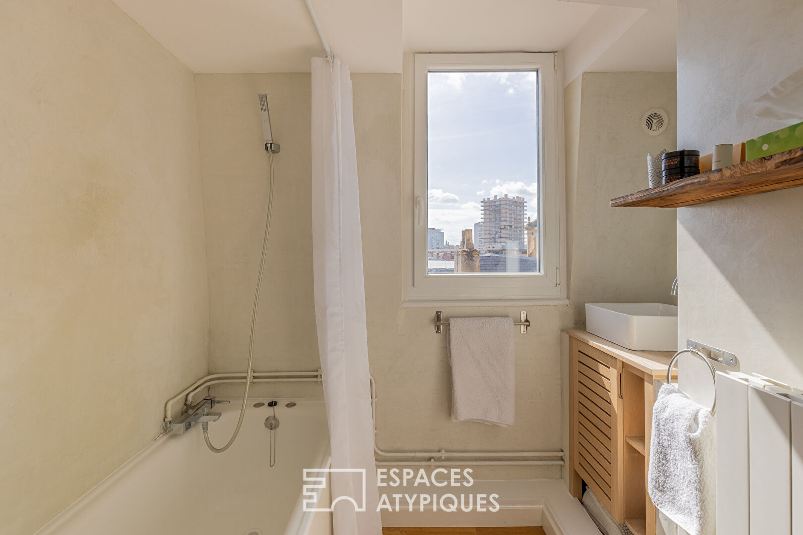 Duplex en dernier étage en coeur de ville