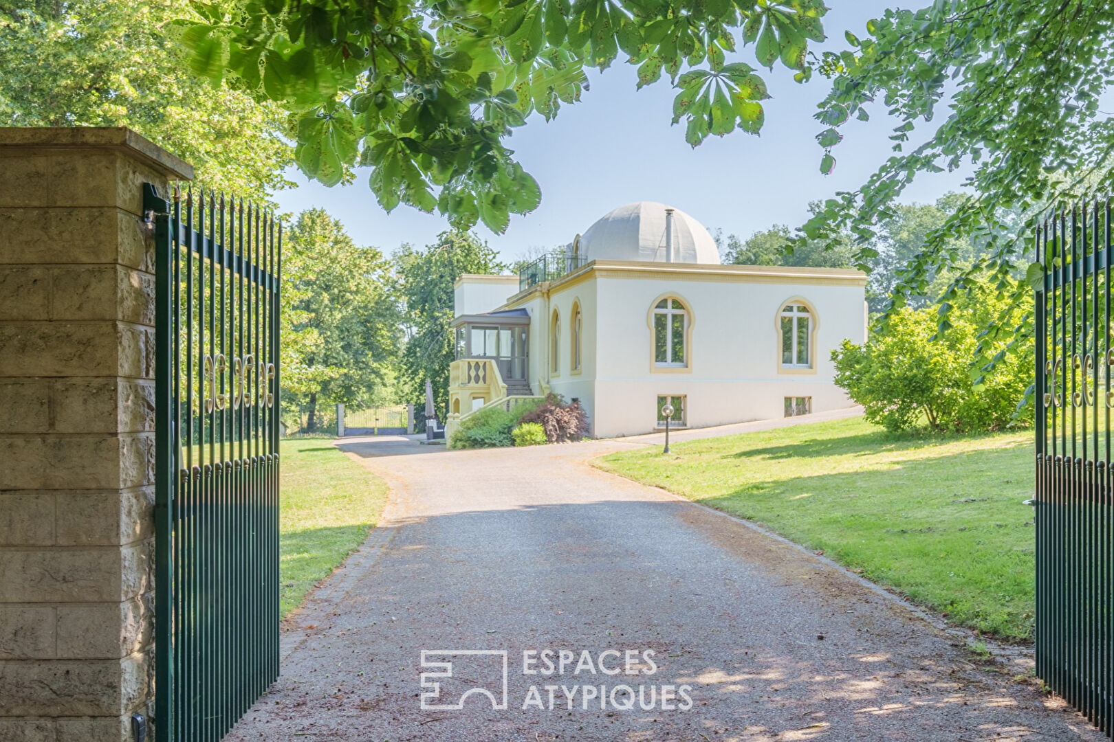 Elegant neo-Moorish residence with wooded park and swimming pool