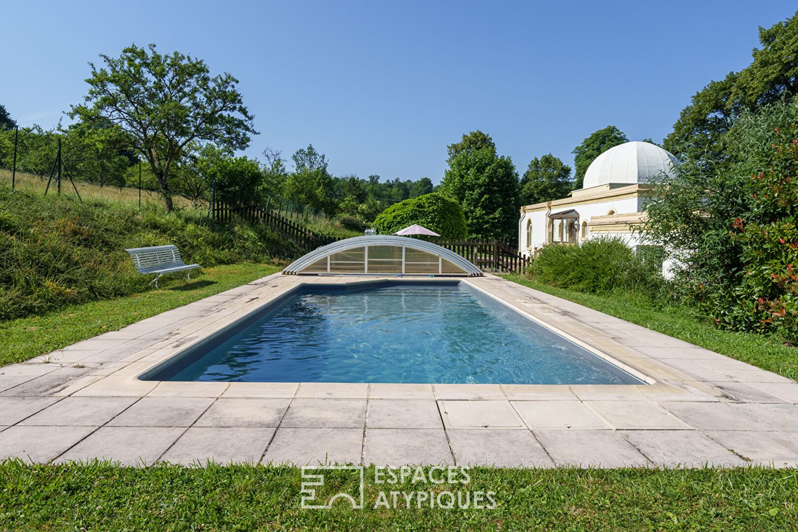 Elegant neo-Moorish residence with wooded park and swimming pool