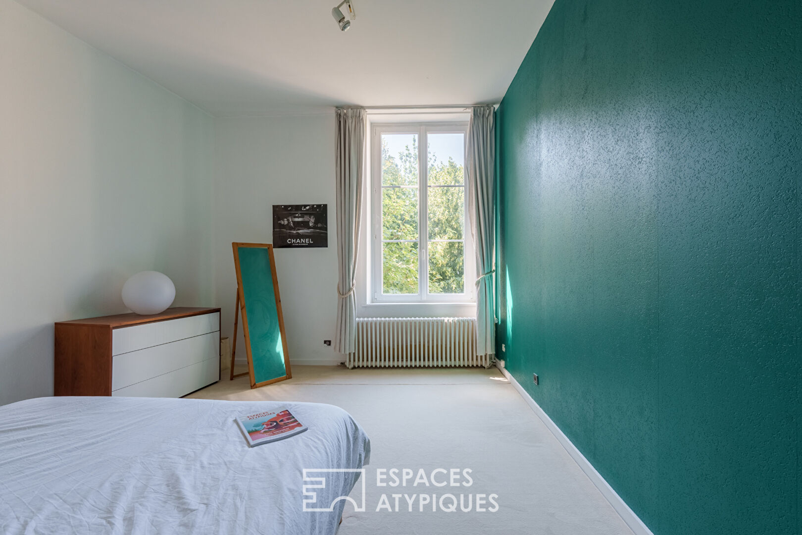 Triplex et son jardin comme une maison en coeur de ville