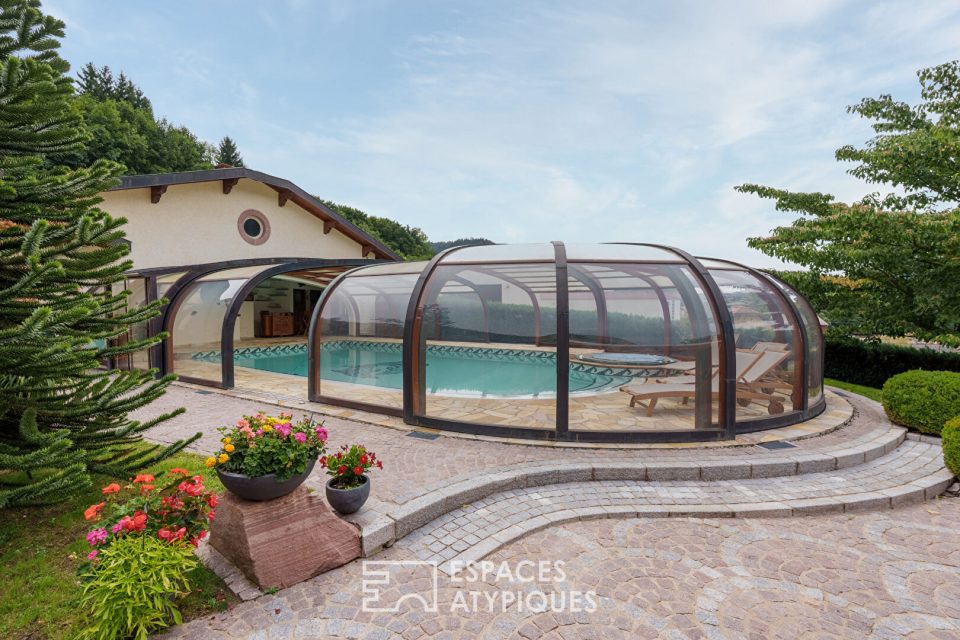 Propriété avec piscine et vaste terrain à proximité du lac de Pierre Percée