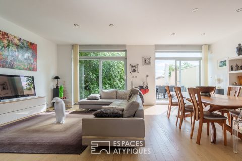 Triplex avec jardin dans une ancienne école