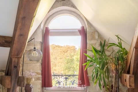 Attic apartment in the heart of the city with exposed beam