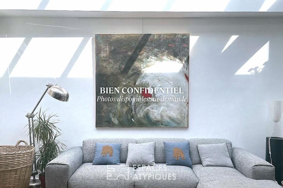 Loft baigné de lumière dans un ancien atelier en coeur de ville