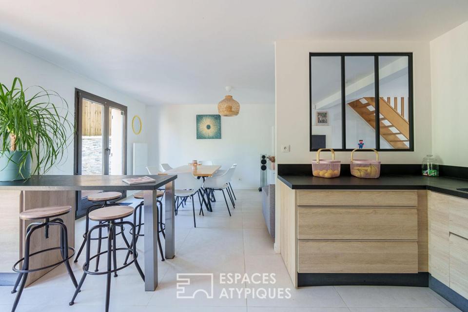 Maison rénovée et son jardin paysager