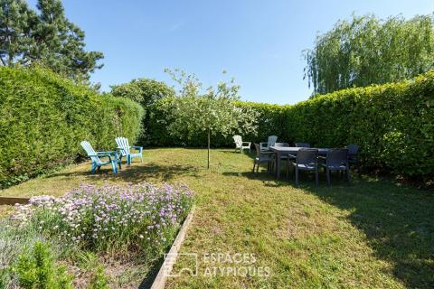 Maison rénovée et son jardin paysager