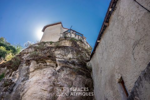 House built on a rock at the foot of the Vercors mountains