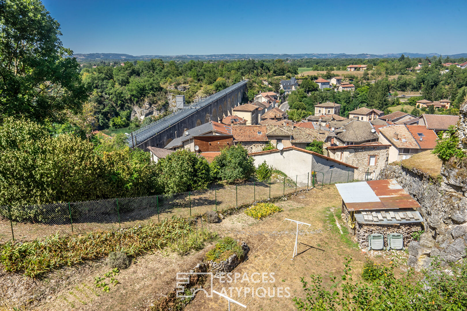 House built on a rock at the foot of the Vercors mountains