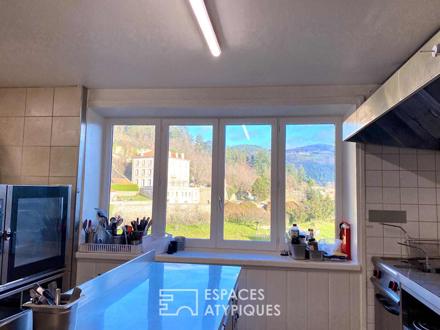 In Ardèche, building combining activity, reception and housing.