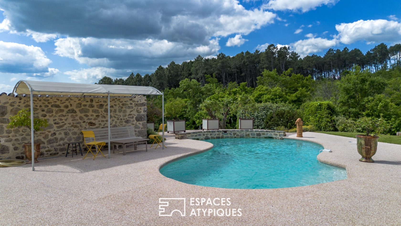 Attractive Ardèche farmhouse with character, swimming pool and outbuildings on remarkably wooded grounds