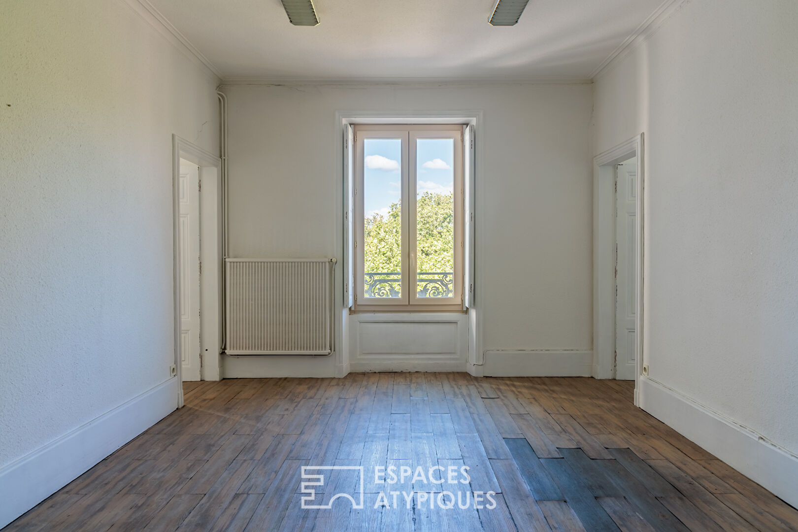 Appartement avec cachet et volumes exceptionnels à rénover