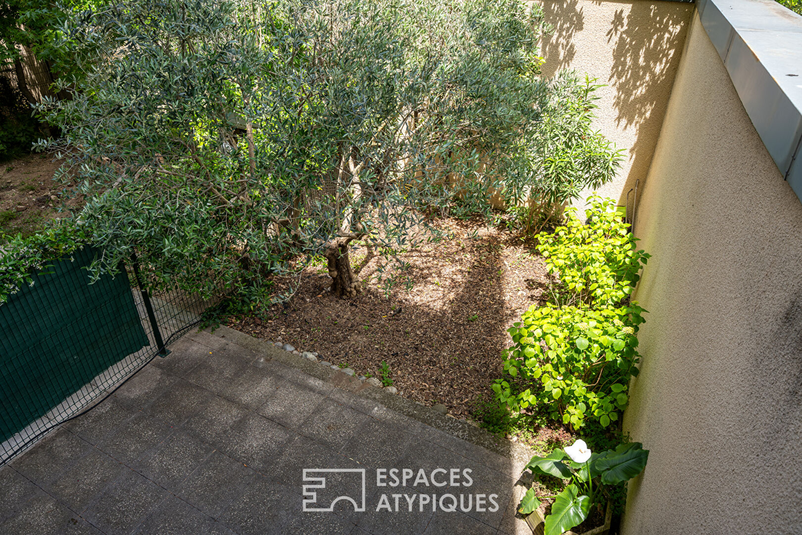 Duplex lumineux avec jardin et terrasses en coeur de Valence