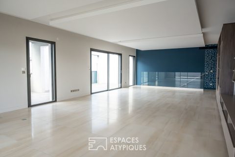 Duplex contemporain en dernier étage avec 2 terrasses et 3 garages