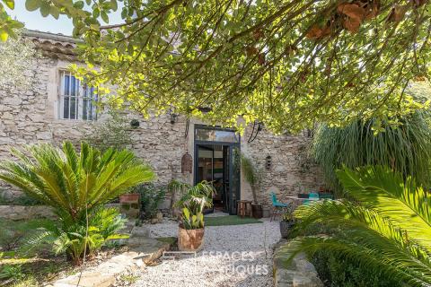 Maison d&rsquo;artiste en pierre avec piscine dans ancienne minoterie réinventée