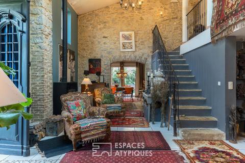 Maison d&rsquo;artiste en pierre avec piscine dans ancienne minoterie réinventée