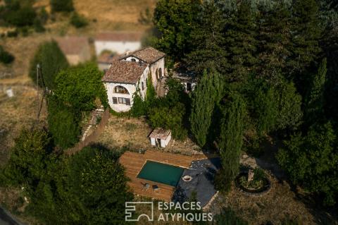 Maison en pierre avec piscine naturelle et vue panoramique