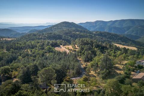 Maison en pierre avec piscine naturelle et vue panoramique