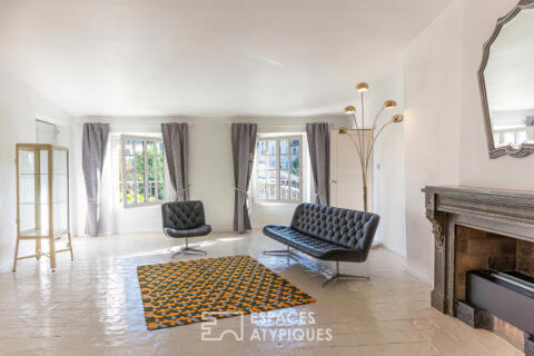 Appartement de charme avec patio privatif et vue exceptionnelle sur les toits