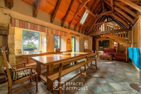 The farmhouse and its breathtaking view of the lush nature.