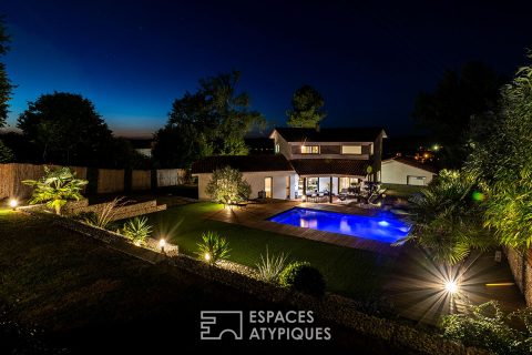 Elegant contemporary and its Garden of Eden