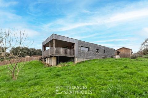 Maison  contemporaine en bois et son design cubique