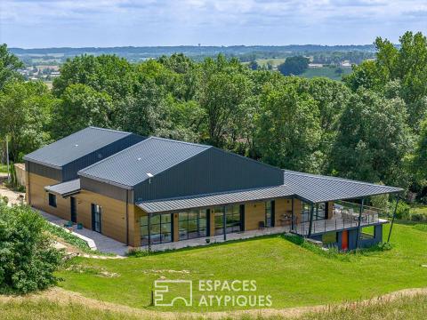 Oeuvre architecturale  avec vue dominante sur  la vallée