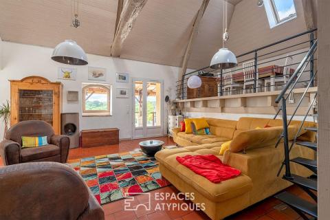 Unique architect-designed house with swimming pool, loft-style feel and independent studio for sale near Bergerac