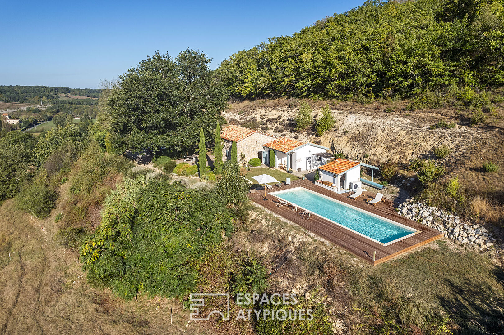 Old renovated sheepfold and its swimming lane overlooking the valley