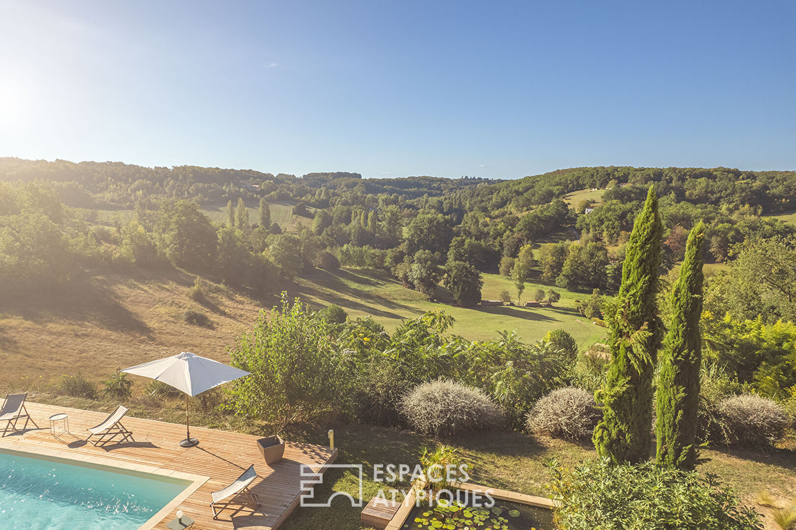 Old renovated sheepfold and its swimming lane overlooking the valley