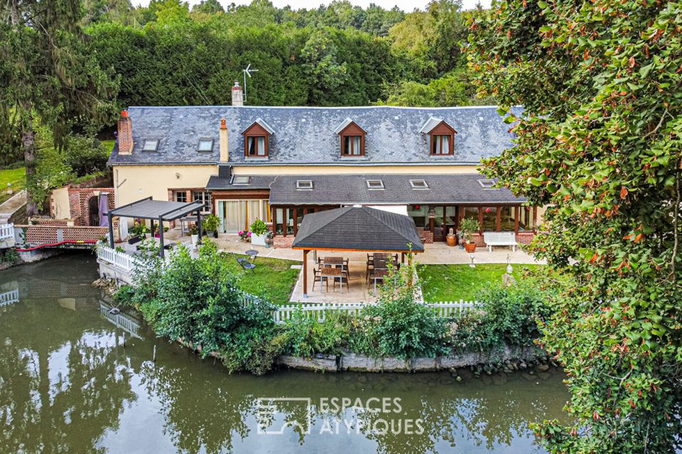 Charmant moulin rénové et ses étangs dans un cadre verdoyant